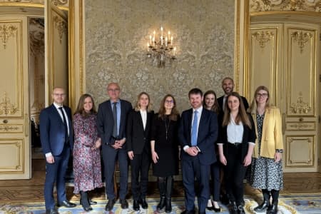 Discussing financial services in Paris and London